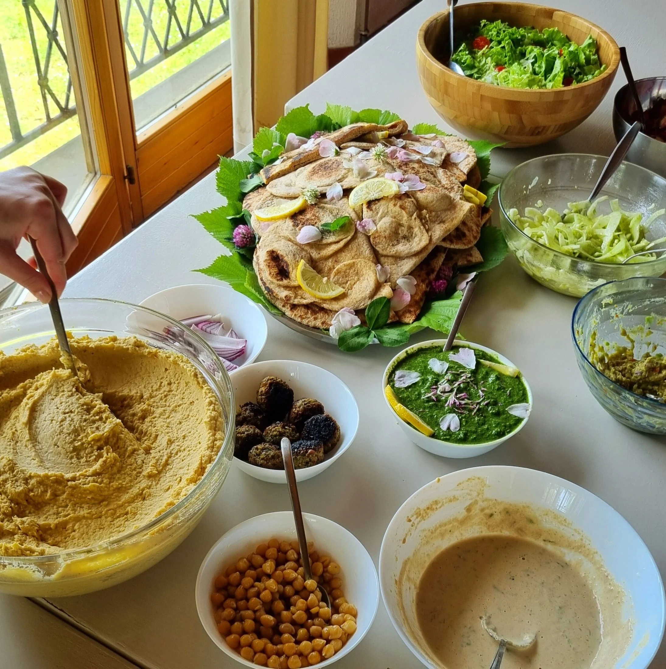 A shared mezze feast at a Honeydew gathering