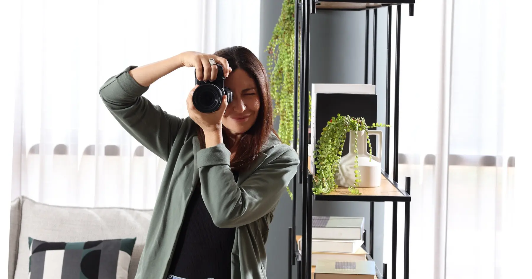 סוזי לוינסון מצלמת